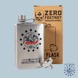 Silver metal flask with an eagle and stars design, labeled "Semiquincentennial 250th Flask," displayed next to a brown box with the Zero Foxtrot logo and text.