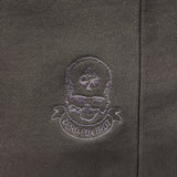 Close-up of a dark fabric with an embroidered skull and spade design, featuring the text "LOST FOX TRD" on the Smuggler French Terry Crew sweatshirt.