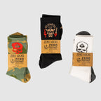 Zero Socks -No Quarter socks displayed in green camouflage, black, and white colorways with graphic designs and branded bands”】【