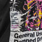 Close-up of a black Damned Dirty Ape Tee featuring a distressed graphic with the quote "You've got to ask yourself one question Do I feel Lucky?" in white and pink text.