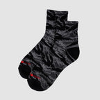 Pair of Zero Ankle Socks - Black Tiger Stripe and Grey featuring a black and grey tiger stripe pattern with a low-cut ankle design and red text detail on the toes.
