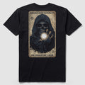 Black Bright Light Continuum Tee featuring a detailed graphic of a cloaked skeleton holding a glowing orb, with text above and below the image on the back of the shirt.