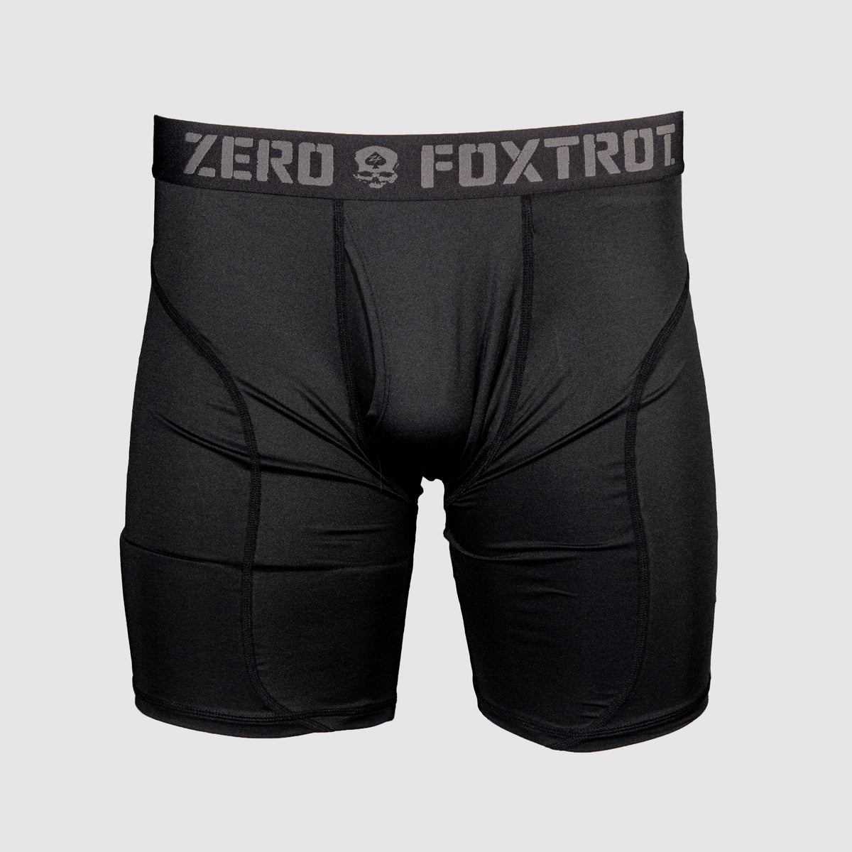 Black athletic boxer briefs with a 6-inch inseam featuring a branded waistband with "Zero Foxtrot" text, designed for comfort and support. Boxer Briefs - 6" Inseam.