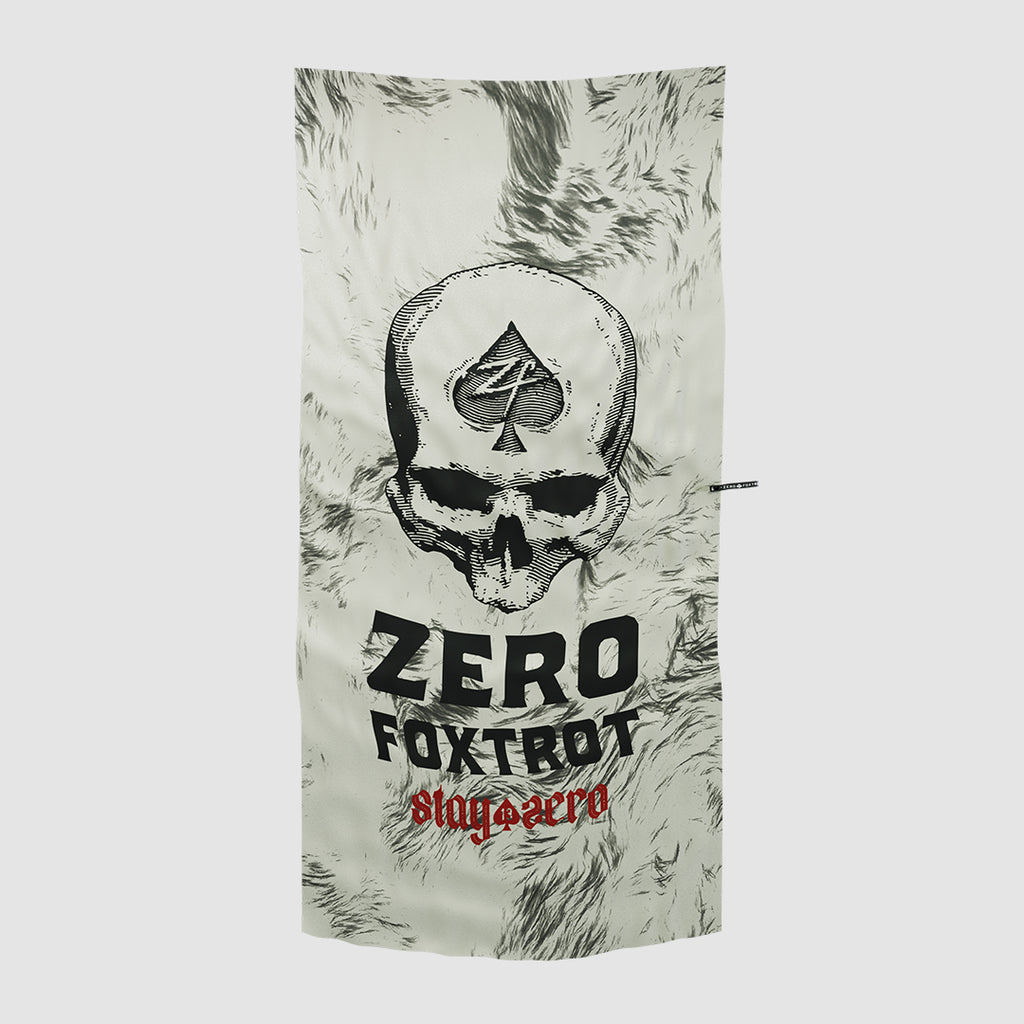 Microfiber Beach Towels featuring a white and gray design with a large skull graphic topped by a spade symbol and bold text reading "Zero Foxtrot" and "stay aero" in red.