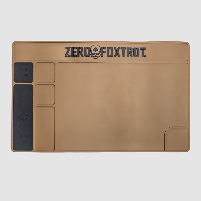 ZF Gun Cleaning Mat in tan color featuring multiple compartments and sections for organizing gun parts and cleaning tools, made of durable material with a skull logo at the top.