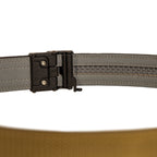 ZF x Kore Sleek Gun Belt shown close up with a black quick release buckle, gray textured strap, stitched edges, and an adjustable inner track