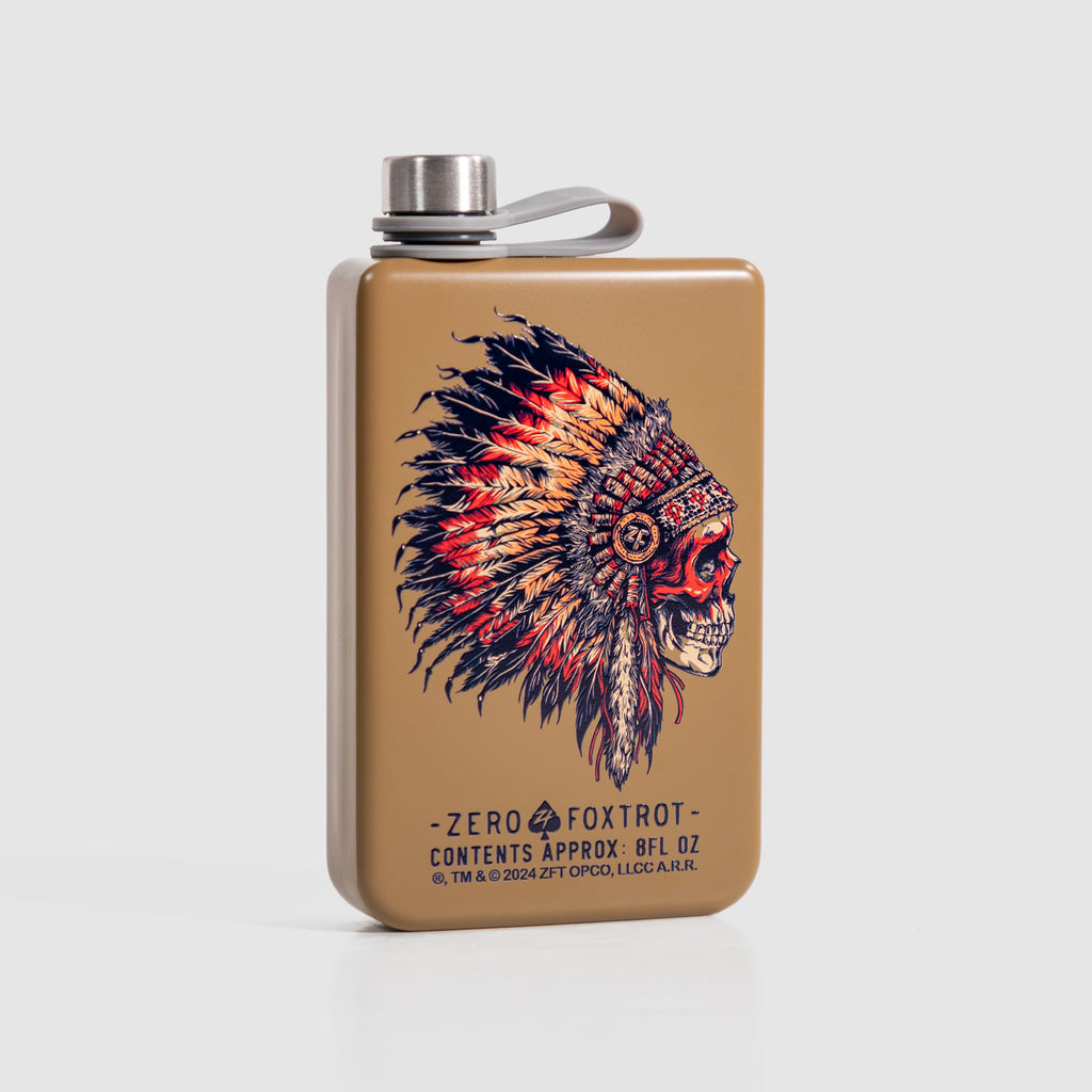 Chief Flask, a tan rectangular metal flask with a silver cap and loop, featuring a colorful feathered headdress skull illustration.