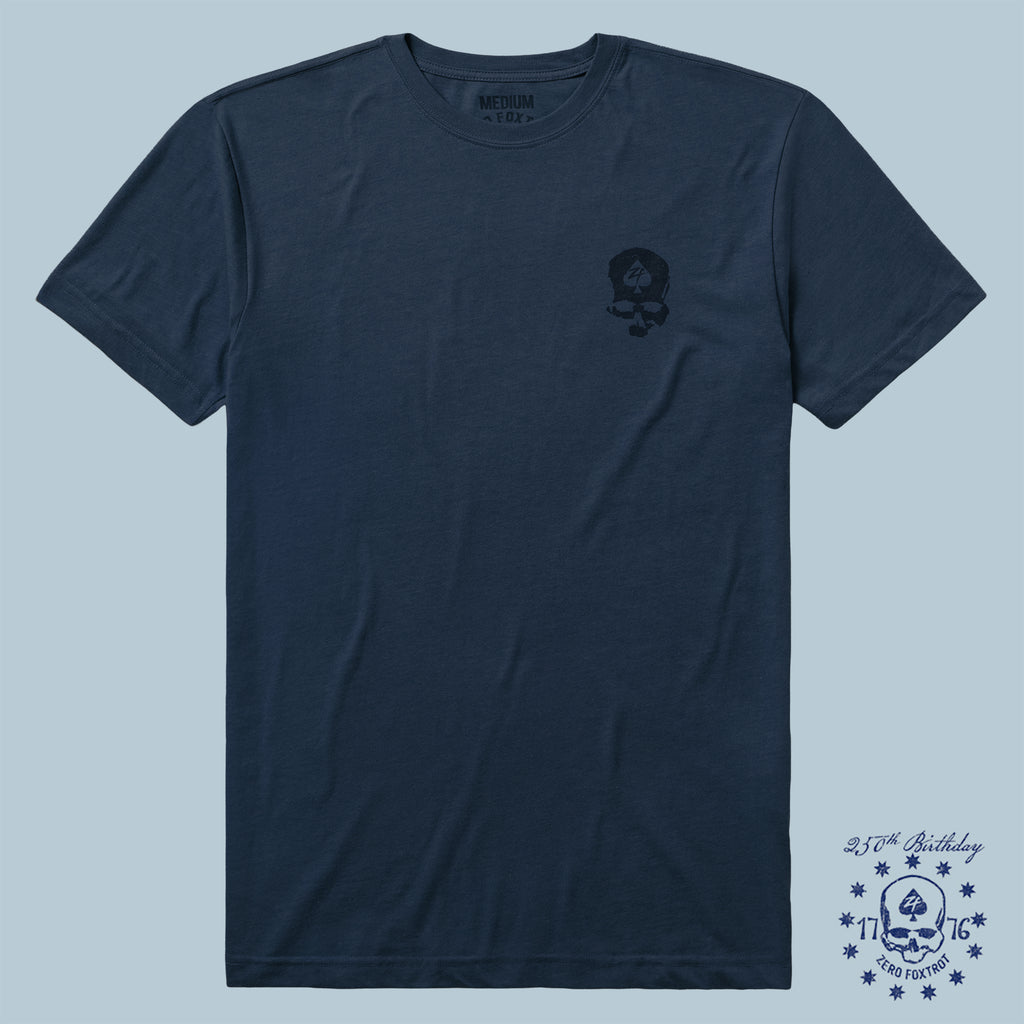 Navy blue short-sleeve crew neck t-shirt with small black skull graphic on the left chest, part of the ZF Core Tee 250th Birthday 3-Pack collection.