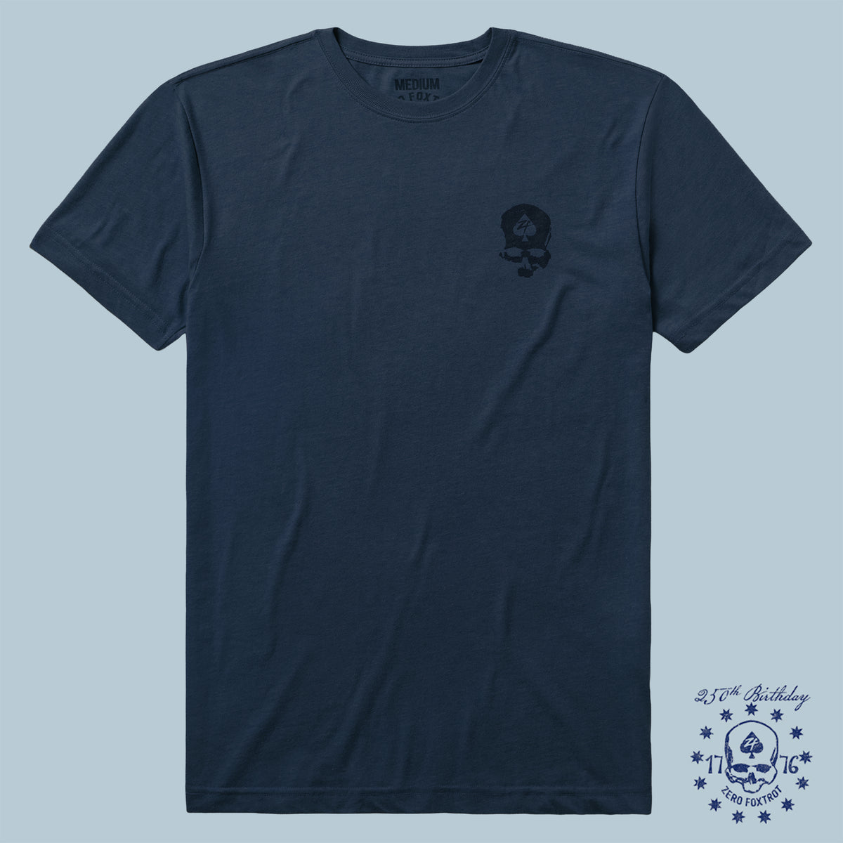 Navy blue short-sleeve crew neck t-shirt with small black skull graphic on the left chest, part of the ZF Core Tee 250th Birthday 3-Pack collection.