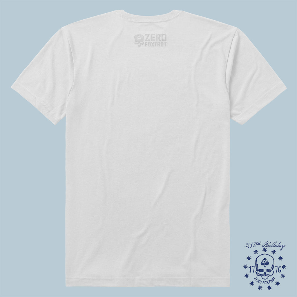 Back view of a plain white t-shirt with a subtle printed logo near the neckline and a blue 250th birthday skull design with stars near the bottom, part of the ZF Core Tee 250th Birthday 3-Pack.