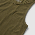 Close-up view of a dark olive ribbed cotton Skivvy Tank showing the sleeveless design and crew neckline.