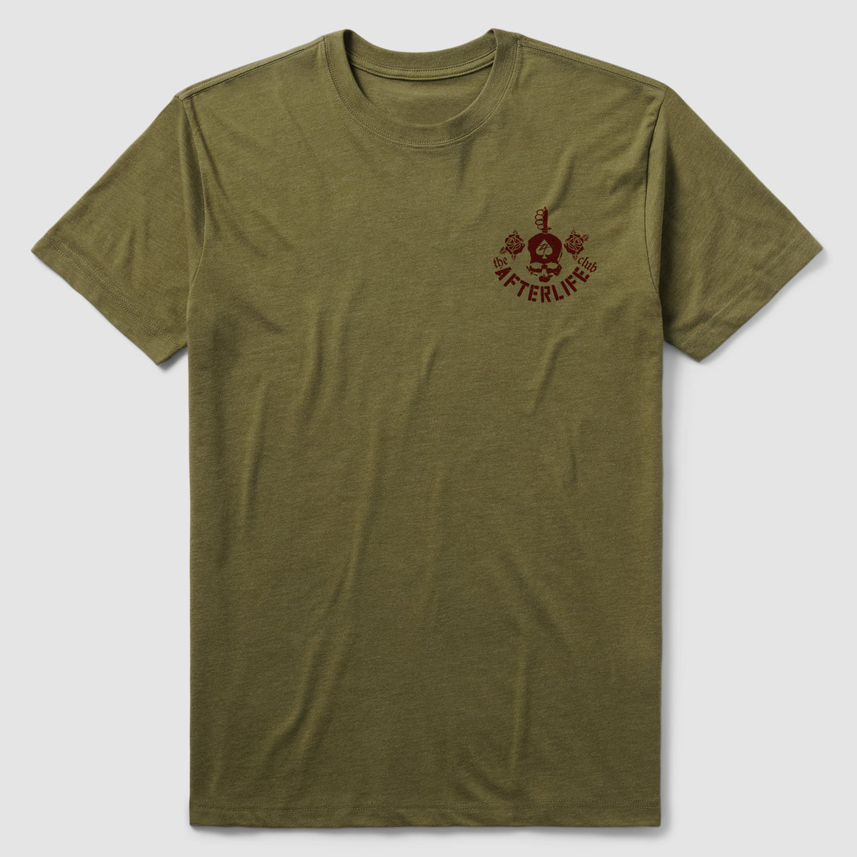 Dancin' with the Devil Tee olive green short sleeve T shirt featuring a small dark red graphic and lettering on the left chest