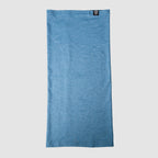 Light blue Performance Sun Gaiter made of breathable fabric, shown flat with a small black tag on the top edge, designed for sun protection and comfort.