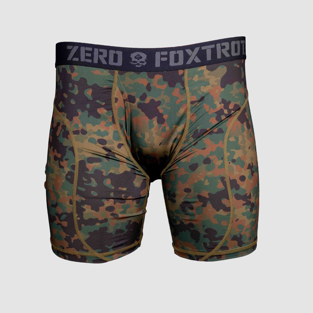 Boxer Briefs - 6" Inseam in a green, brown, and black camouflage pattern with brown stitching and a black waistband featuring "ZERO FOXTROT" branding.