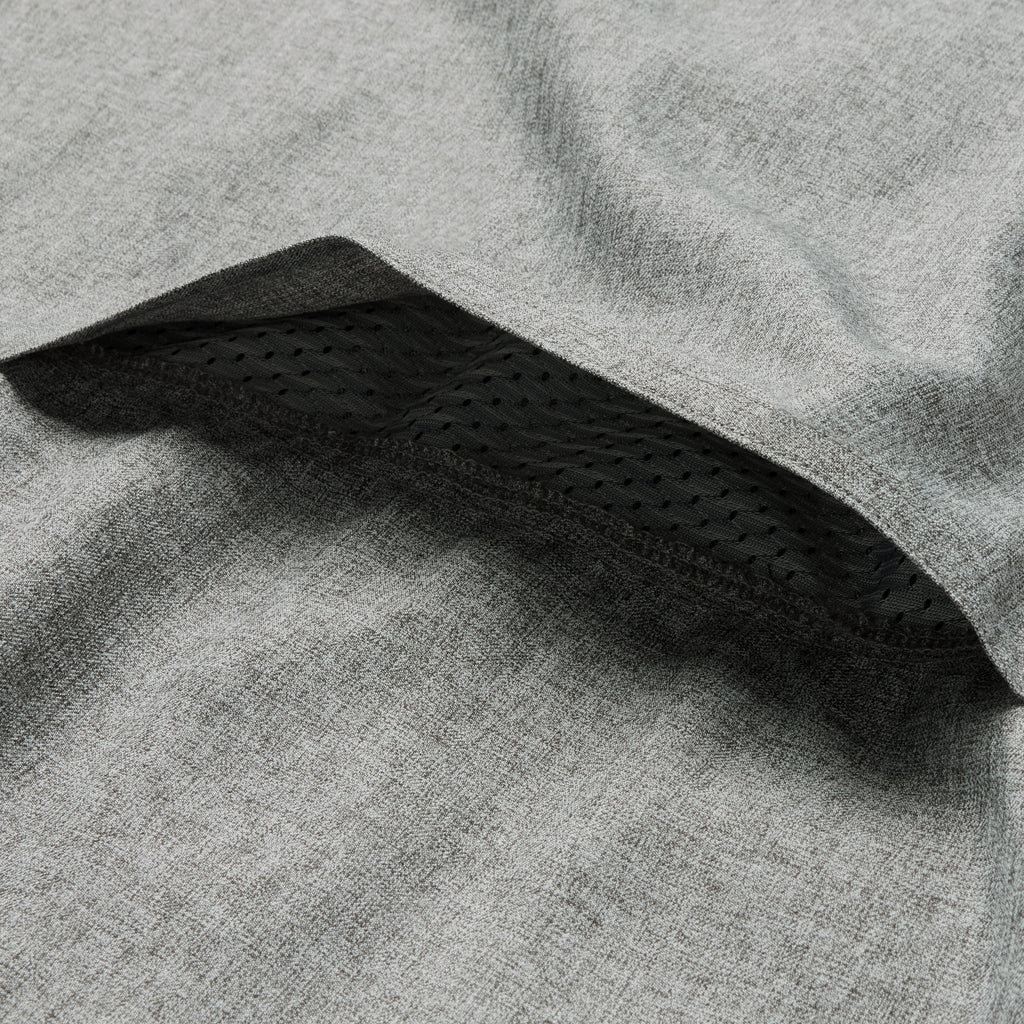 Close-up of the breathable mesh inner lining detail on a gray fabric of the F'n Soft Daily Shirt designed for comfort and ventilation.