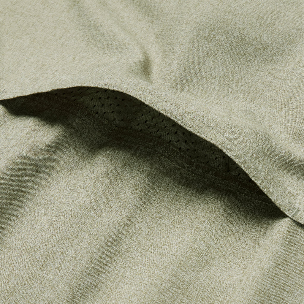 Close-up of the sage green F'n Soft Daily Shirt fabric showing a vent detail with breathable mesh lining for enhanced comfort and ventilation.