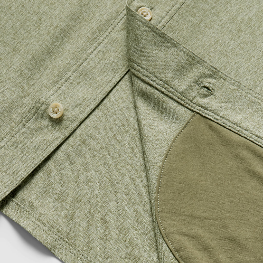 Close-up of the sage green F'n Soft Daily Shirt showing textured fabric, button details, and smooth inner lining.