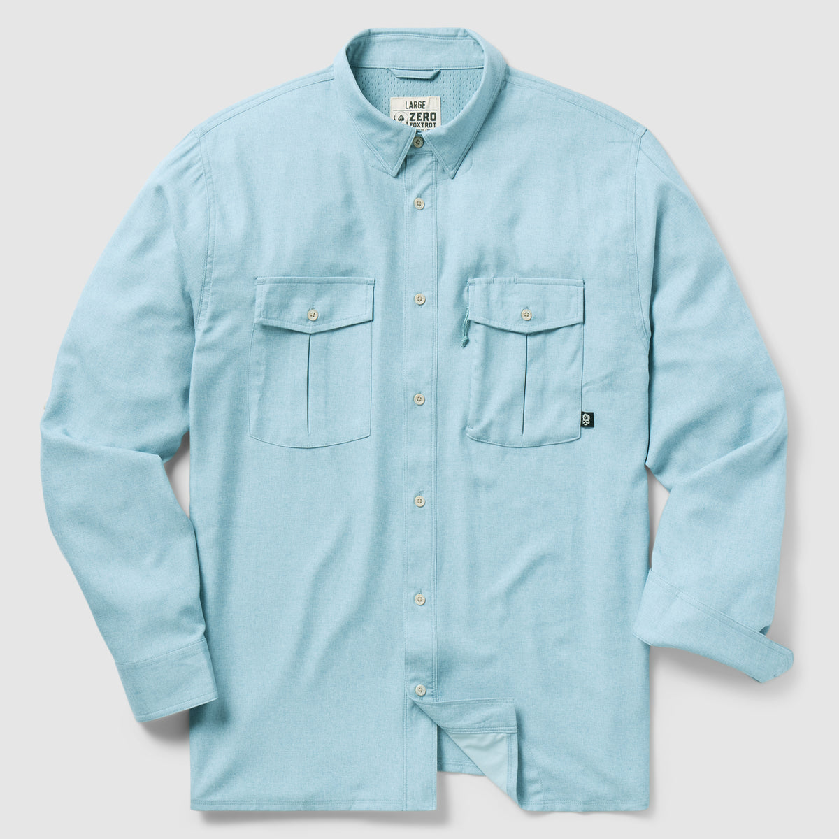 Light blue button-up casual shirt with long sleeves and two chest pockets, shown laid flat, featuring a soft fabric texture, named F'n Soft Daily Shirt.