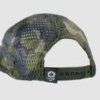 Full Mesh Cap featuring camouflage breathable mesh panels an adjustable snapback closure and a skull patch on the back band