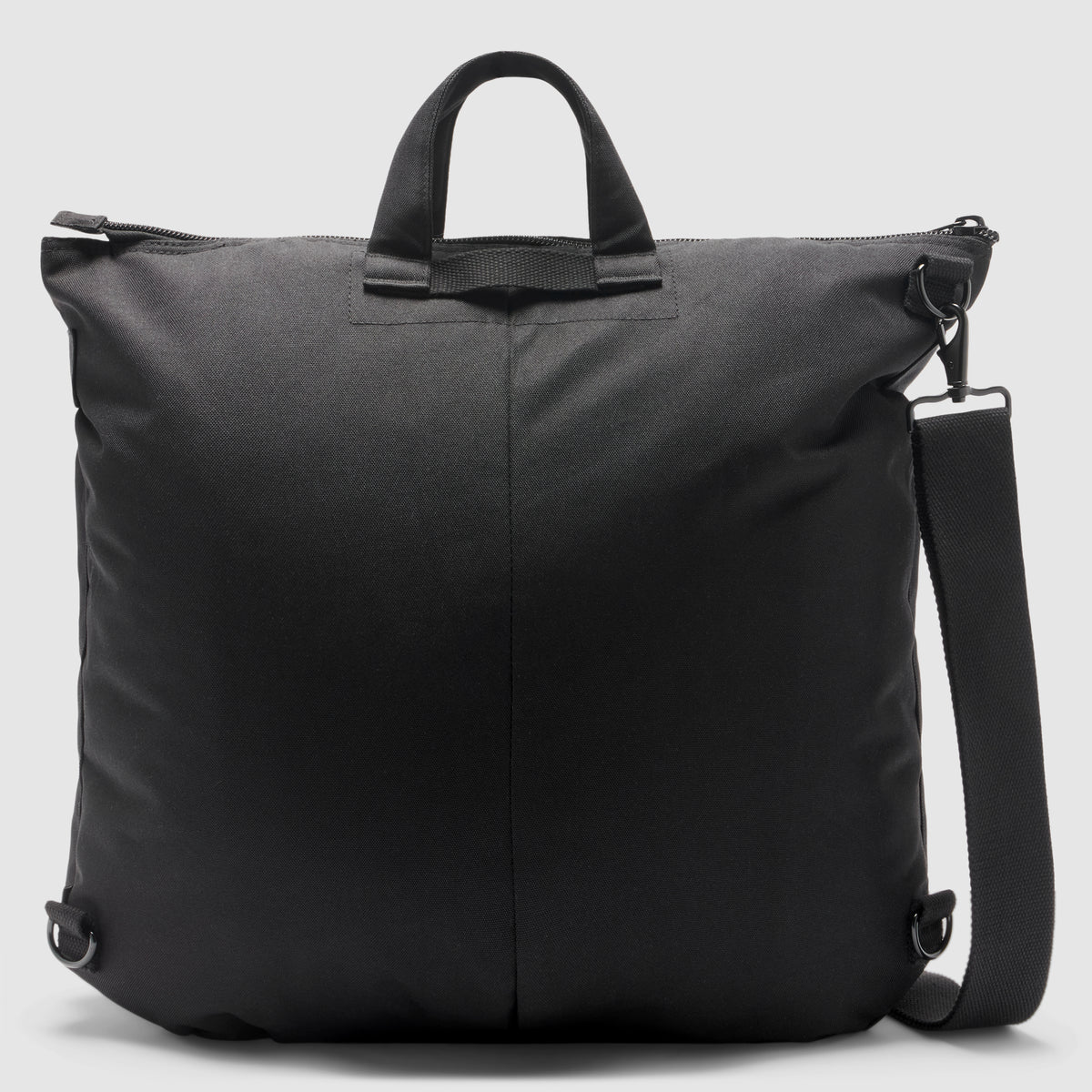 ZF Flyers Helmet Bag in black with dual carry handles, zippered top, side attachment rings, and a detachable adjustable shoulder strap against a plain background