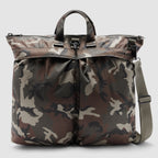 ZF Flyers Helmet Bag in camouflage with dual handles, zip top, front compartments, and adjustable shoulder strap shown against a light background