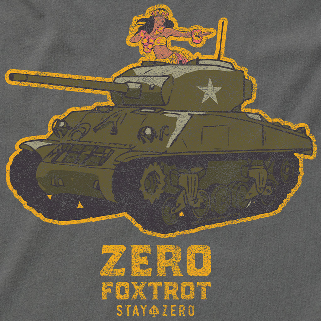 Close-up detail of a graphic on the Hula Tank featuring a green military tank with a woman in a hula skirt and flower lei dancing atop the turret, accompanied by yellow text that reads "ZERO FOXTROT STAY ZERO.