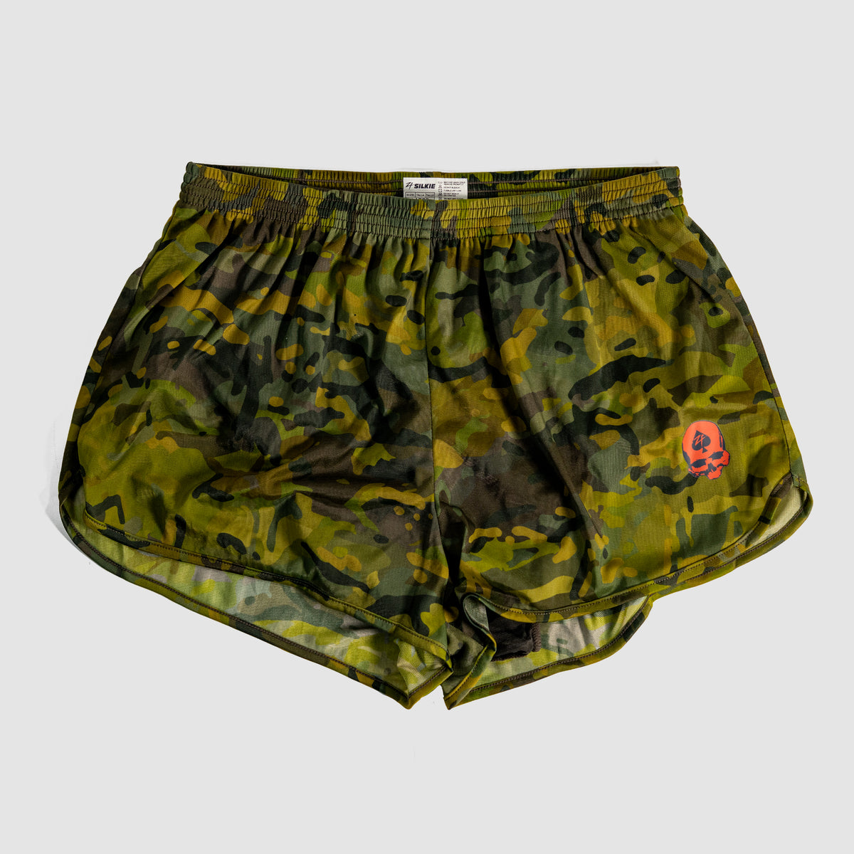 ZF Silkies - Camos lightweight men's shorts in green and brown camouflage pattern with a small red skull logo on the front left leg.