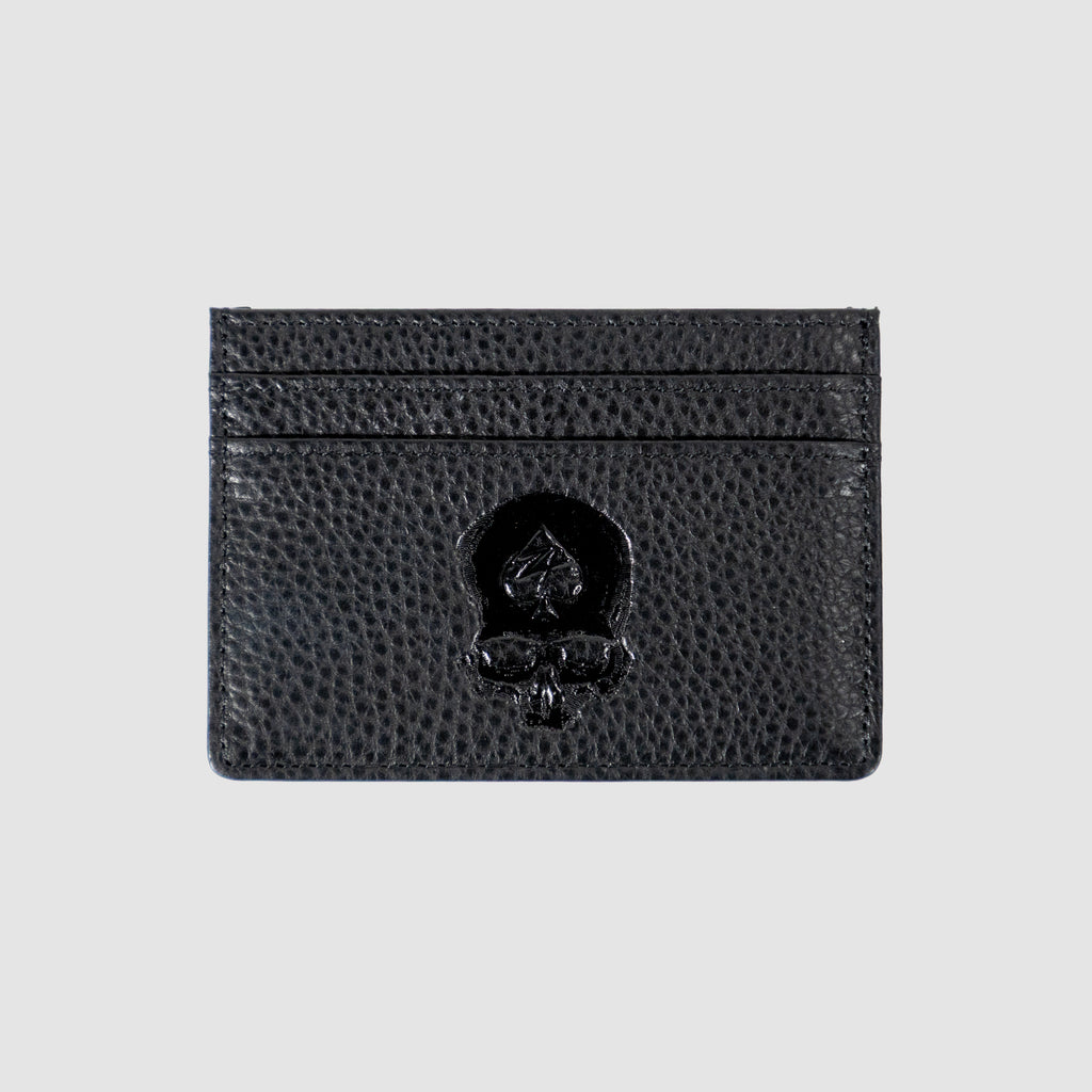 Black textured Leather Cardholder featuring a skull and spade embossed design with multiple card slots for organized storage.