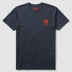 Namakubi Tee in dark gray featuring a small red graphic design with a skull and spade symbol on the left chest, made from soft cotton fabric with a classic crew neckline.