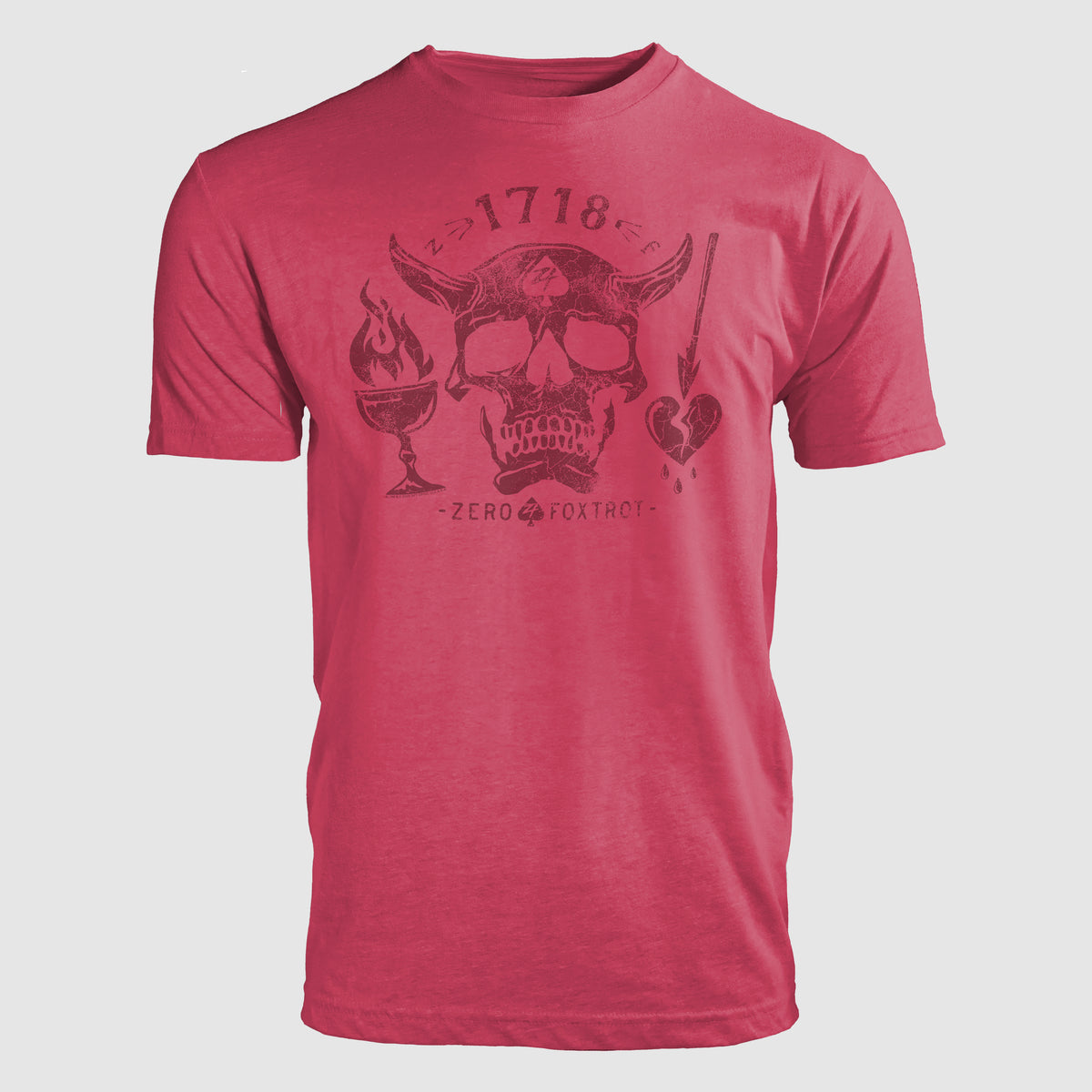 Blackbeard 1718 Tee in red featuring a central skull with horns, a flaming goblet on the left, and a dagger piercing a heart on the right with "1718" text above.