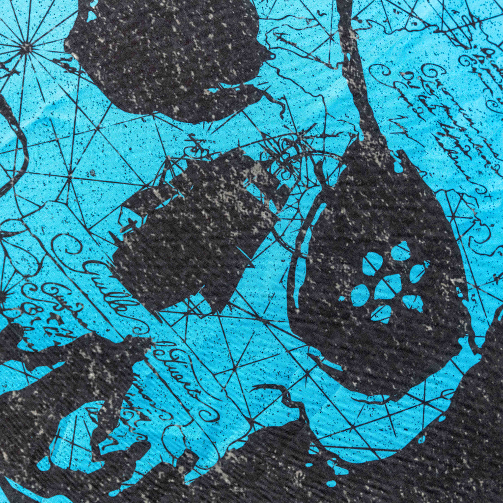 Never Say Die Flag featuring a distressed black graphic with abstract shapes and lettering over a vivid blue background for an edgy artistic look