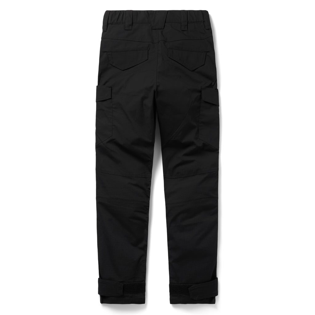 Tac Pants in black, shown laid flat with multiple utility pockets, belt loops, articulated knees, and adjustable ankle cuffs