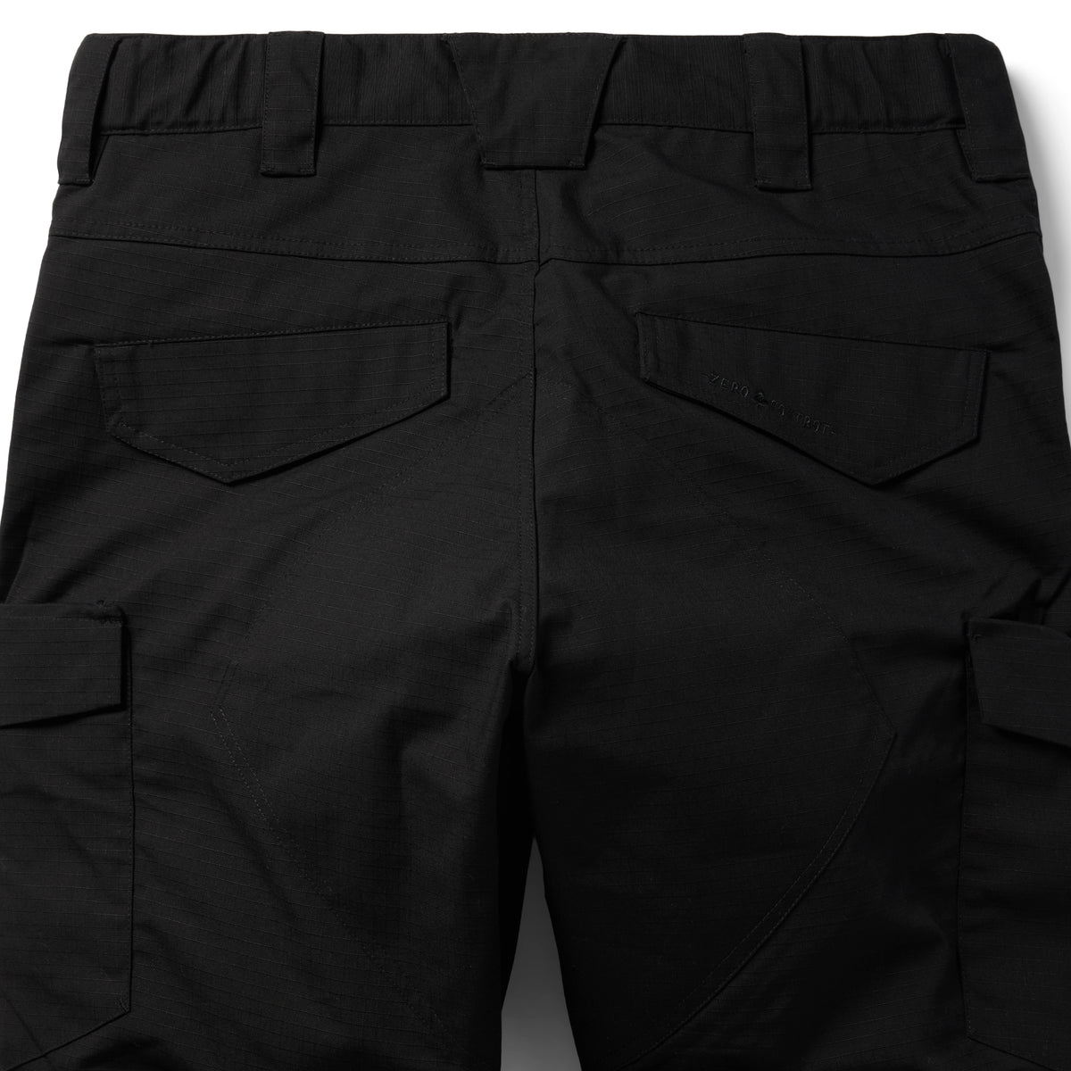 Tac Pants black cargo pants shown from the back with belt loops, flap back pockets, side utility pockets, and articulated knee panels
