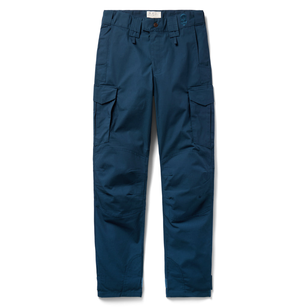 Tac Pants navy blue cargo pants shown from the front with multiple utility pockets belt loops and a straight leg design against a white background