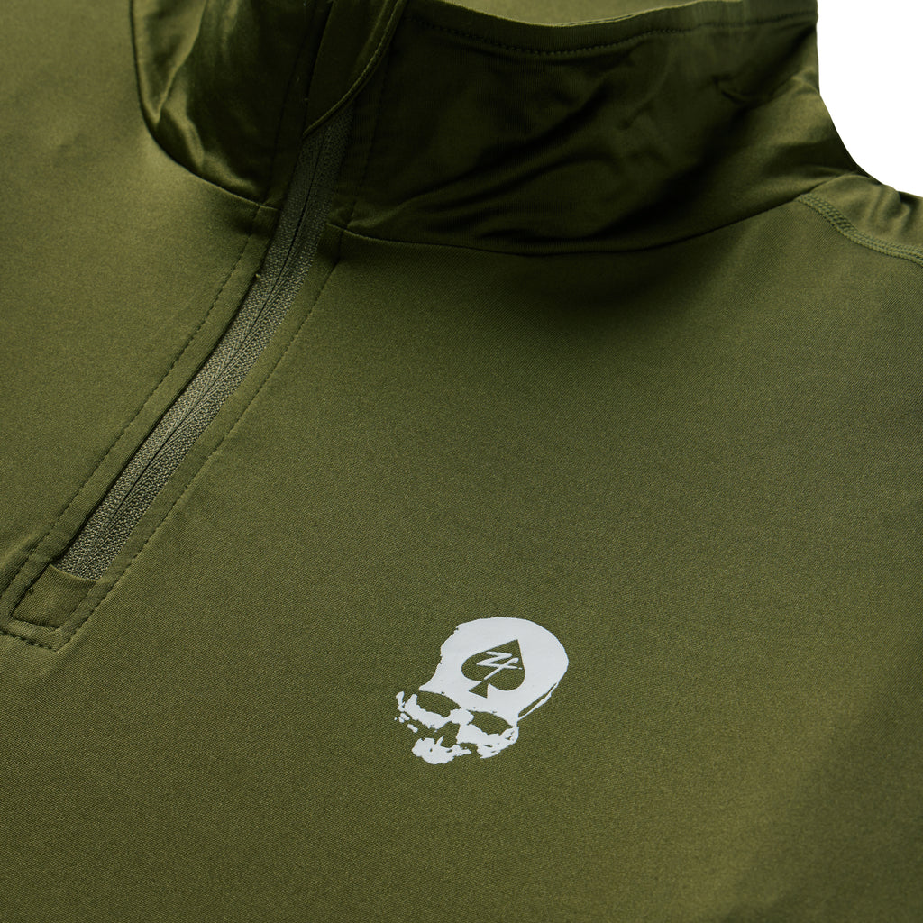 Olive green PT 1/4 Zip Long Sleeve (Last Chance) with a quarter zip collar and white skull graphic on the chest close up