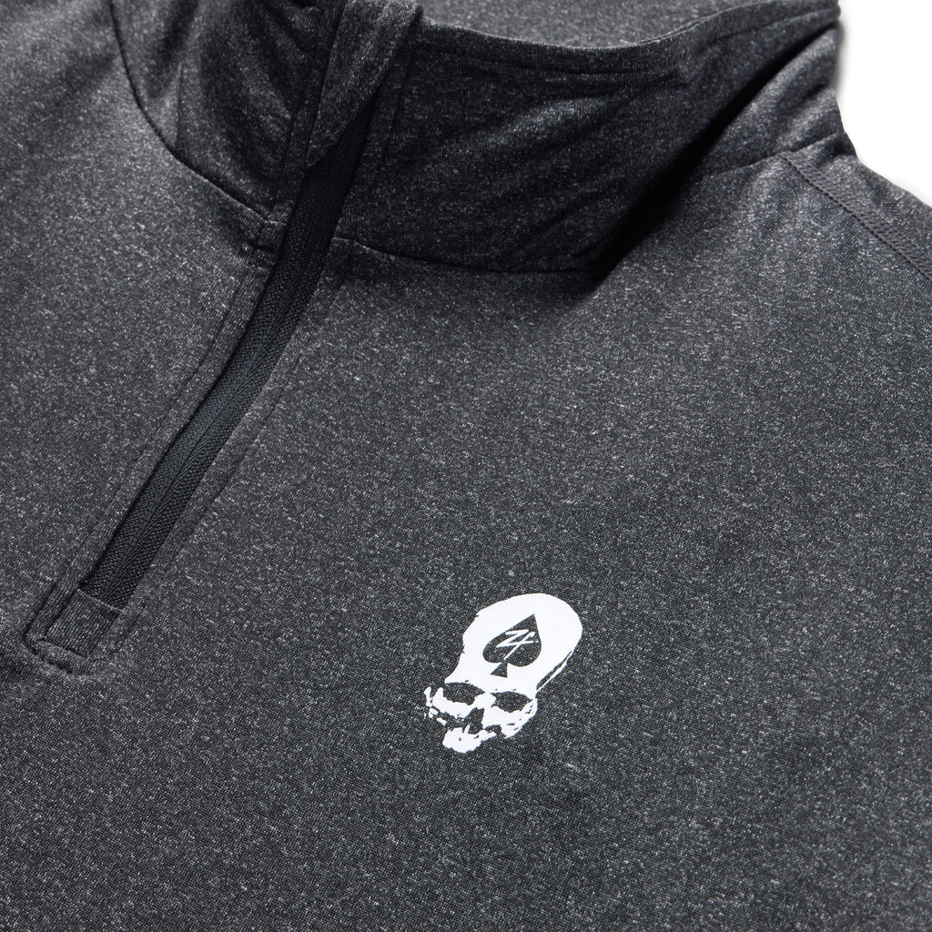 PT 1/4 Zip Long Sleeve (Last Chance), close-up of a dark gray quarter zip top with a high collar, black zipper, and white graphic emblem on the chest