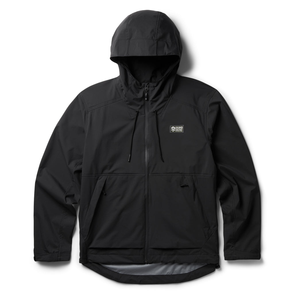 Packable Zero Rain Shell black hooded rain jacket with full zip closure, drawstring hood, zippered pockets, and adjustable cuffs displayed against a white background