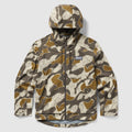 Packable Zero Rain Shell jacket with a camo pattern in shades of tan, brown, and cream, featuring a hood and front zipper for weather protection.