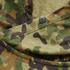 Close-up of camouflage-pattern fabric with snap buttons on the Performance Sun Hoodie, highlighting detailed stitching and durable material.