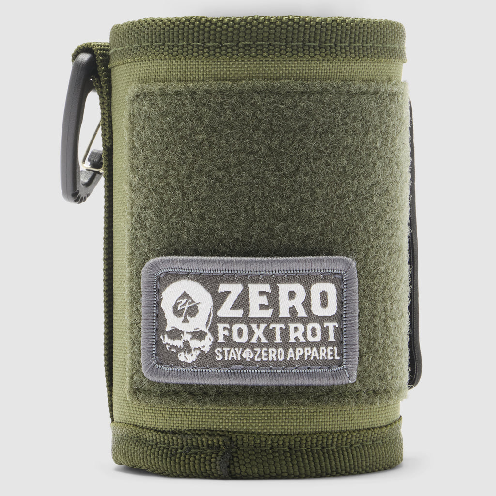 Olive green Rations Drink Wrap with a gray Zero Foxtrot patch and side carabiner clip shown against a light background