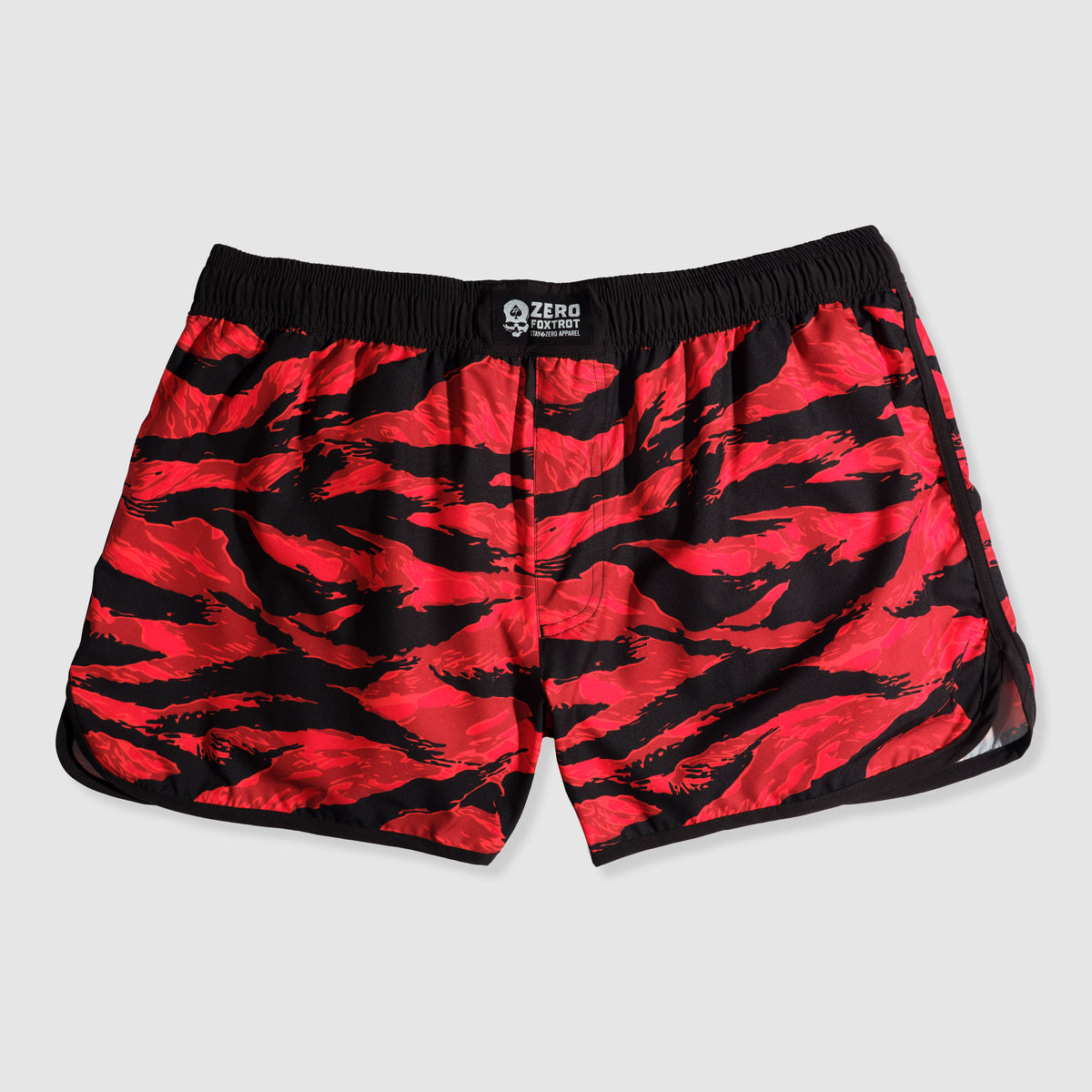 Red and black tiger stripe patterned ZF Fight Shorts with an elastic waistband and a small logo patch at the center front, designed for comfort and mobility.