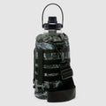 TAC Ruck Bottle - 64oz, black and gray tactical water bottle with carry handle, protective cover, adjustable straps, and wide shoulder strap.