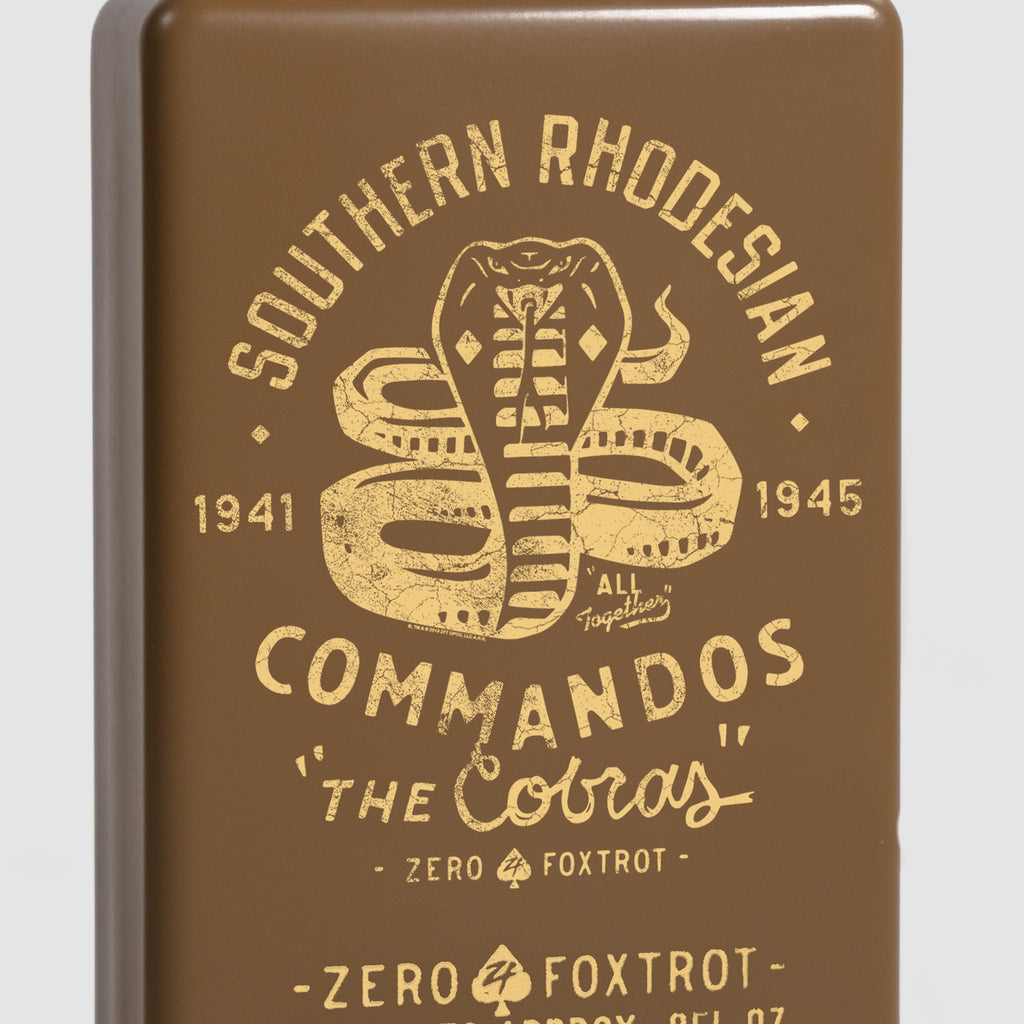 Brown metal flask featuring vintage-style yellow graphic of a coiled cobra snake with text "Southern Rhodesian Commandos," "The Cobras," and "Zero Foxtrot," labeled SRC Cobras Flask.