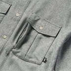 Close-up of the chest area of the Short Sleeve F'n Soft Shirt in charcoal, highlighting the buttoned flap pockets and soft textured fabric.