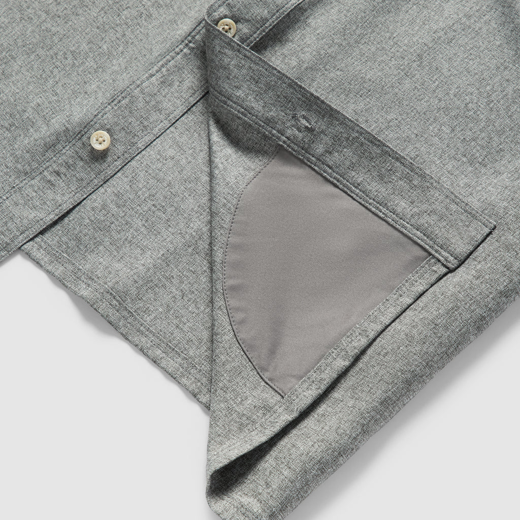 Close-up of the inner side of a gray Short Sleeve F'n Soft Shirt showing a soft fabric lining and button detail along the placket.