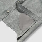 Close-up of the inner side of a gray Short Sleeve F'n Soft Shirt showing a soft fabric lining and button detail along the placket.