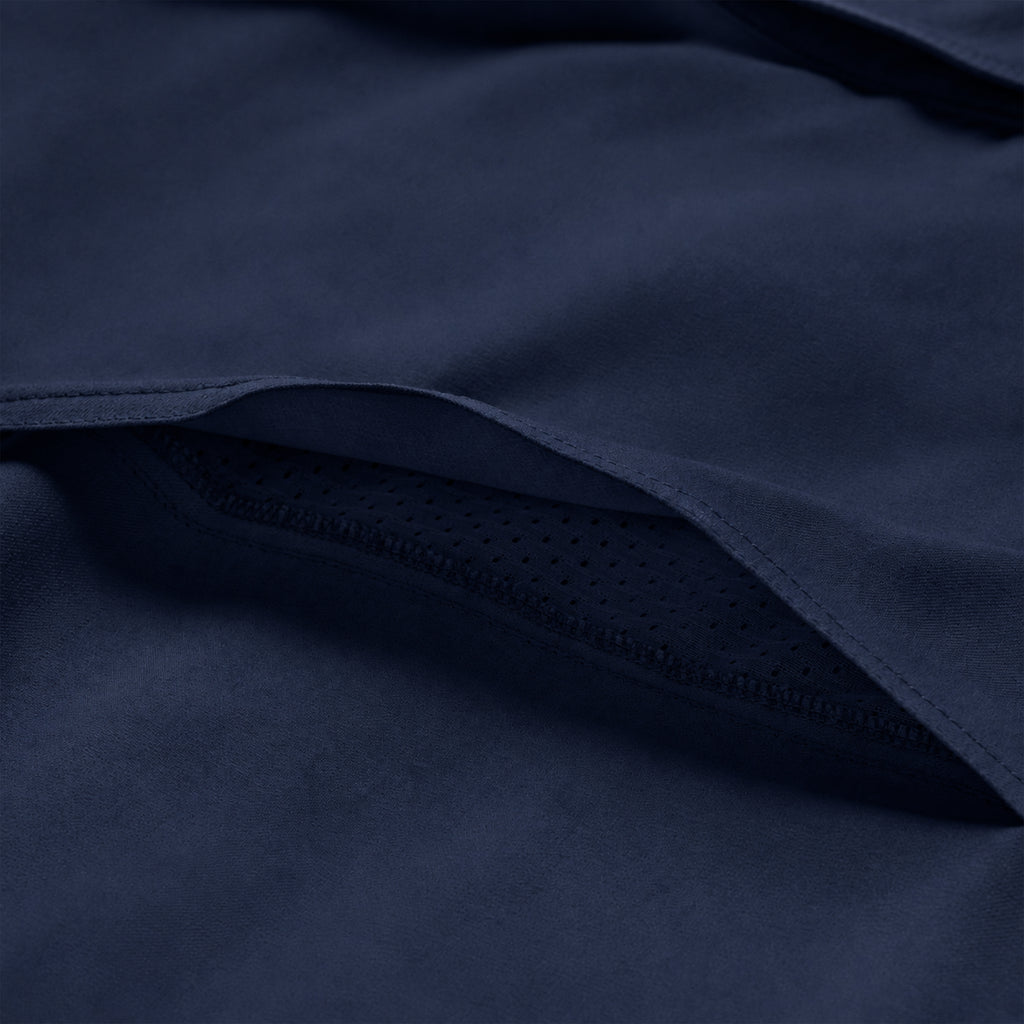 Short Sleeve F'n Soft Shirt in close up showing dark navy fabric, stitched seams, and a perforated mesh panel for breathable comfort