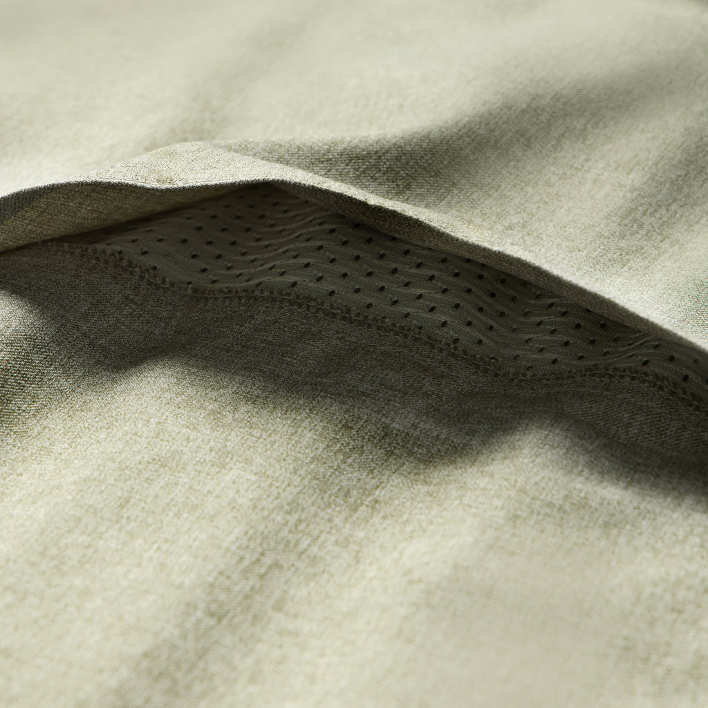 Close-up of sage green fabric texture and breathable mesh detail on the Short Sleeve F'n Soft Shirt, highlighting softness and ventilation features.