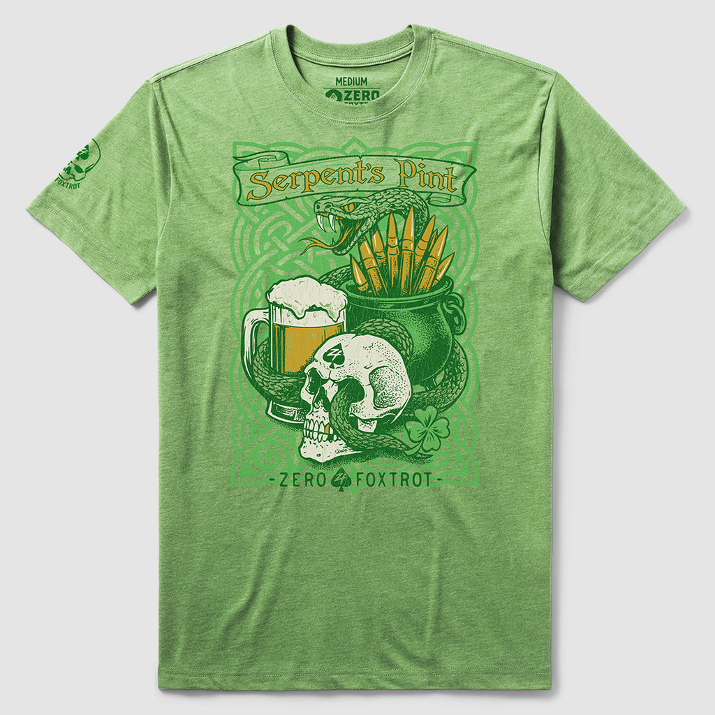 Green Serpent's Pint Tee featuring a detailed graphic of a snarling serpent above a foam-topped beer mug, a skull, and a pot filled with arrows, accented with clovers and Celtic-inspired patterns.