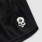 ZF Silkies - Solids black Silkies close up featuring a white skull logo and neatly stitched hem on smooth fabric.
